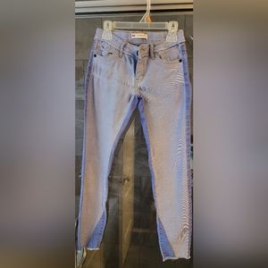 Girl Levi's skinny jeans size 10 REG 2 toned with fringe on legs and pocket